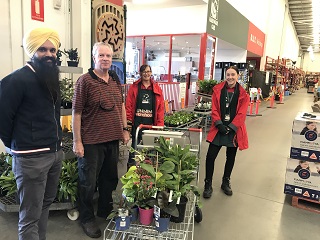 Bunnings Staff Help Residents to Smell the Roses