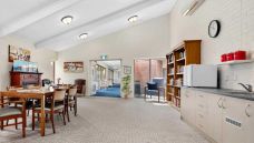 Bupa-Aged-Care-Campbelltown-Library-with-kitchen-and-cafe