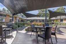 Bupa-Aged-Care-Bateau-Bay-outdoor-deck-near-dining-space
