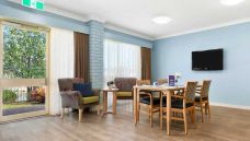 Bupa-Aged-Care-Enfield-dining-room-with-garden-view-in-door-frame