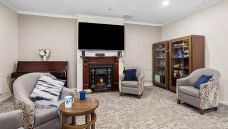 Bupa-Aged-Care-Windsor-lounge-with-fireplace